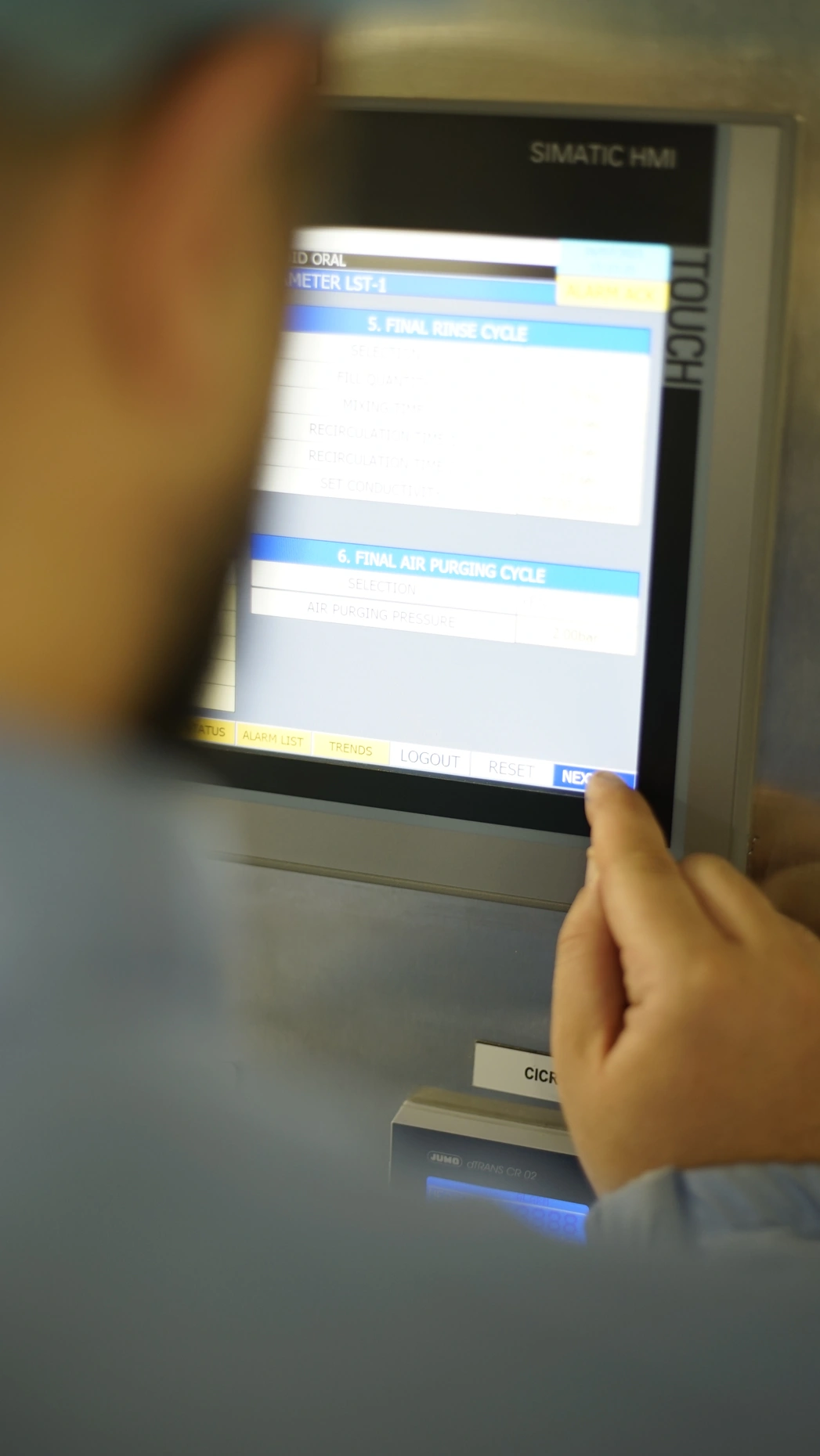 Pharma facility worker with connected systems