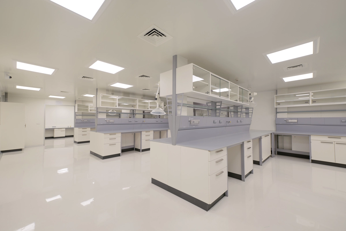 QC laboratory analysts working at a testing bench